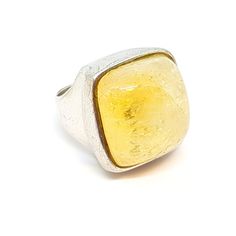 Large ring with a large yellow stone and made of silver. Circa XX. Weight: 19.66 grams. Dimensions It has an inner diameter of 18.2 mm which corresponds to a size 8 1/2 USA. Composition: ** Silver 950, stamped. To see photos. Do not hesitate to request all the extra information you need, we will be happy to answer you. See photos for your own impression (please note photos were taken under artificial light so colors may differ) All the items that we sell have their own personality, they are not Amber Rings With Large Stone For Anniversary, Citrine Ring With Large Stone, Modern Yellow Gemstone Rings, Modern Yellow Ring Jewelry, Vintage Silver Ring With Large Stone, Hippy Gifts, Yellow Stone, Large Ring, Art Deco Earrings