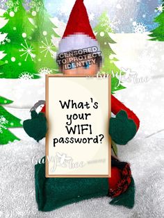 an elf holding a sign that says what's your wifi password?