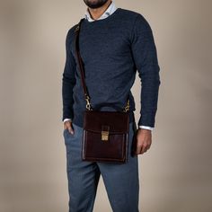 A perfect companion for the modern man. A small full-grain leather briefcase with a classic, timeless look and a sturdy frame for those who like to keep it light and leave the home office at home. But since you cannot fit your wallet, smartphone, keys, and now a tablet in the pockets of your pants, this is the bag that will accommodate those essentials that you can't leave home without. This small and compact bag has the look of a classic business briefcase combined with the ease of carrying a messenger bag. Features * Tablet sized - fits iPad Mini, Kindle, and Nook. All at once if you wish; * Carry handle with pleasant grip for easy carrying in hand; * Detachable shoulder strap; * Two main compartments and additional pockets outside and inside; * An outside zip pocket right at your side; Brown Messenger Bag, Business Briefcase, Anniversary Gift For Him, Compact Bag, Christmas Gifts For Him, Anniversary Gifts For Him, Leather Briefcase, Handbags For Men, Leather Items