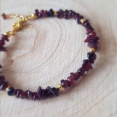 Garnet Bracelet - Raw Gemstone Bracelet- Dainty Bracelet - Stacker Bracelet - January's Birthstone - Birthstone Jewelry - Gift For Her A Pretty And Easy To Wear Bracelet, A Perfect Gift For Anyone Born In January. With Genuine Garnet And Gold Plated Round Beads. Also Available In Silver Plated Finish 7” Inches Bracelet Finished With A Lobster Clasp And 1.5” Inches Chain Extender Comes In Velvet Jewelry Pouch And Small Box, Ready To Be A Beautiful Gift Adjustable Garnet Gemstone Bracelets, Adjustable Garnet Gemstone Bracelet, Adjustable Garnet Bracelets Gift, Adjustable Garnet Bracelet Gift, Adjustable Garnet Bracelet As Gift, Raw Garnet, Born In January, Garnet And Gold, Velvet Jewelry