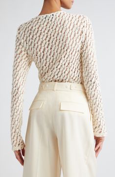 An open weave and a puckered effect sweeten the style of a graceful top made from a cotton-first blend. 22" length (size 38eu) Boatneck Long sleeves 65% cotton, 31% polyamide, 4% elastane Dry clean or machine wash, line dry Made in Portugal Lace Turtleneck Top, Lace Turtleneck, Cream Lace Top, Skirt Swimsuit, Cream Blouse, Boat Neck Tops, Black Lace Tops, Open Weave, Turtle Neck Top