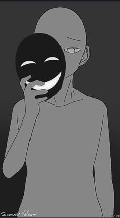 a person with a mask on their face holding a black object in front of his face