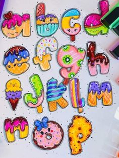 the letters and numbers are made out of different types of doughnuts, ice cream, and sprinkles