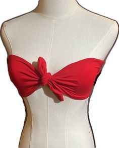 Red Bandeau Tube Top With Built-in Bra, Red Bandeau Tube Top For Spring, Red Strapless Tube Top For Summer, Red Strapless Tube Top For Beach, Chic Red Summer Tube Top, Red Tube Top For Vacation, Chic Red Tube Top For Summer, Red Strapless Tops With Built-in Bra, Stretch Red Top For Beach Season