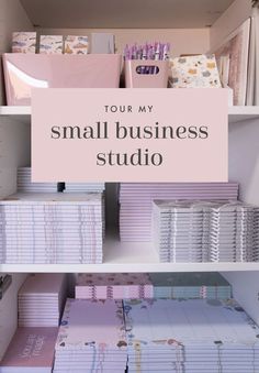 the small business studio is organized with pink and white binders