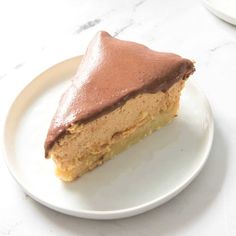 a piece of cake sitting on top of a white plate