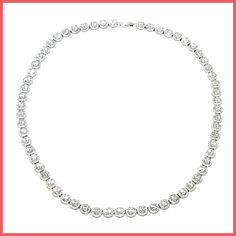 Highest quality, crystal clear cubic zirconia stones in a halo setting, set in a sterling silver tennis necklace that will stun with its sparkle and clarity. Truly a spectacular piece, for a special occasion! 17" long, comprised of a total of 912 stones. Interior setting stones are 4mm in diameter. Safety clasp. Imported by Italian Ice Dazzling Rhinestone Round Tennis Necklace, Dazzling Rhinestone Tennis Necklace, White Gold Tennis Necklace With Rhinestones, White Gold Rhinestone Tennis Necklace, Dazzling Cubic Zirconia Tennis Necklace Round Cut, Dazzling Cubic Zirconia Round Cut Tennis Necklace, Rhinestone Tennis Necklace, Silver Crystal Tennis Necklace With Round Cut, Dazzling Round Cut Tennis Necklace With Sparkling Stones