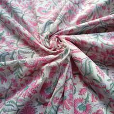 a pink and green floral print fabric