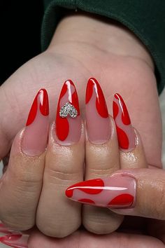 Get ready to turn heads with the perfect red nails!