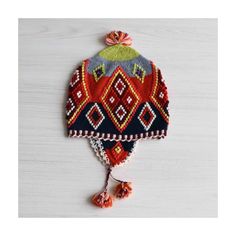 Peruvian hat, chullo with embroidered details, handmade woolen hat. Colorful chullo hat handmade in the south of Peru by women. Article number: 22-4203-05 Color: multi Material : 100% sheep wool Dimensions: Width 24 cm / 9.5 inch Weight: 0.15 lbs / 0.07 kg Price including shipping. World wide delivery Handmade Bohemian Beanie One Size, Bohemian Knitted Beanie Cap, Bohemian Knitted Beanie, Traditional Multicolor Hat One Size Fits Most, Traditional Festival Hat One Size, Bohemian Multicolor Beanie Cap, Traditional Beanie Hats For Winter, Traditional Beanie For Winter, Bohemian Hand Knitted Beanie