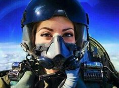 a woman wearing a gas mask and pilot's gear