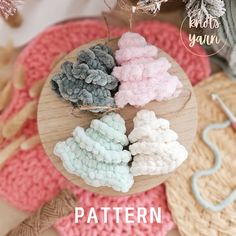 crocheted pinecone ornaments are displayed on a round wooden plate with text overlay that reads, knit your own pattern