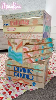 three wooden boxes stacked on top of each other with the words diyvinic drinks painted on them