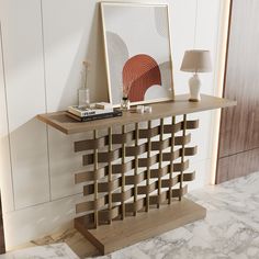 a modern console table with books on it