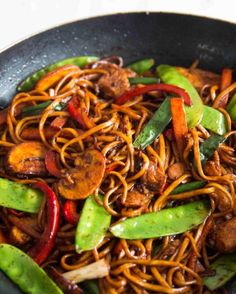 stir fry with meat and vegetables in a wok