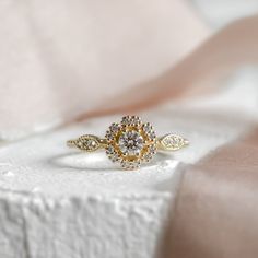 a close up of a ring on a cloth