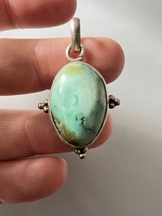 Vintage Native American Sterling Silver Light Green Blue Turquoise Pendant 1.4" | eBay Blue Turquoise Necklace With Large Chrysocolla Pendant, Turquoise Necklace With Large Round Stone, Blue Turquoise Chrysocolla Necklace With Large Pendant, Turquoise Necklace With Large Chrysocolla Pendant, Green Oval Cabochon Turquoise Necklace, Untreated Oval Blue Turquoise Necklace, Blue Chrysocolla Jewelry With Large Stone, Spring Wishlist, Silver Lights