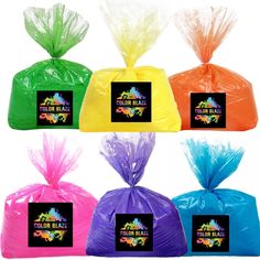 six bags filled with different colors of plastic