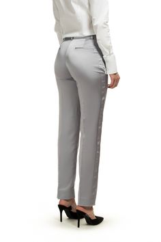 Glowing silver bullet. Elegant Silver Fitted Pants, Elegant Fitted Silver Pants, Elegant Fitted Silver Bottoms, Fitted Silver Trousers, Silver Fitted Trousers, Elegant Silver Formal Pants, Elegant Silver Pants For Workwear, Silver Fitted Bottoms For Formal Occasions, Elegant Silver Full-length Pants