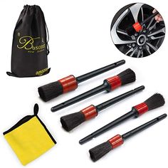 four black and red brushes in front of a bag