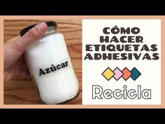 a hand holding a jar with some type of substance in it and the words, como hacer etiquetas adhesivas