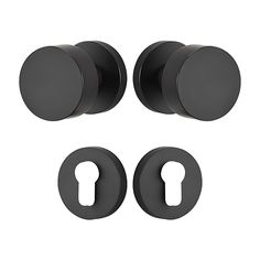 three black door knobs and two round handles