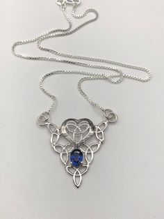 This Irish Celtic Trinity Knot necklace is a lovely piece for the Irish lass in your life, or for you! I've fabricated this piece in .925 sterling silver and features an 6mm round gemstone, of your choosing in the drop down menu, which is faceted and set within a sturdy 4 prong setting. The size of the pendant is 1.75 across and 2 inches top to bottom. Also, this comes with a sterling silver box chain, 1.2mm in thickness, which is strong and is secured by a lobster claw. I have two chain length Custom Sterling Silver Pendant Necklace, Sterling Silver Oval Pendant With Clasp, Sterling Silver Oval Pendant, Custom Fine Jewelry Sterling Silver Pendant Necklace, Sterling Silver Oval Necklace With Silver Clasp, Sterling Silver Jewelry With Oval Pendant, Silver Spiritual Necklace For Anniversary, Sterling Silver Pendant Jewelry For Anniversary, Handmade Sterling Silver Necklaces Fine Jewelry