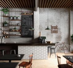 the interior of a restaurant with tables and chairs