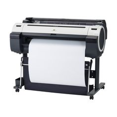 a large plot printer sitting on top of a black and white stand with a roll of paper in front of it