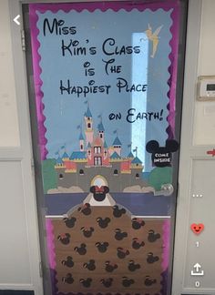 the door to mickey mouse's class is decorated with an image of his castle