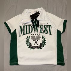 a white and green polo shirt with the words midwivest on it's chest