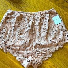 Gorgeous Lace Shorts. Pink Color. Has Lining. Waist - 12” But It Does Have A Elastic Band That Stretches More. Lace Bottoms For Summer Loungewear, Spring Lace Brief Bottoms, Feminine Lace Lounge Bottoms, Lace Pajama Shorts For Summer, Spring Lace Shorts For Loungewear, Lace Bottoms For Summer Daywear, Summer Lace Bottoms For Daywear, Casual Lace Bottoms For Daywear, Casual Pink Lace Bottoms