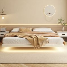 a bedroom with a bed, nightstands and lamps