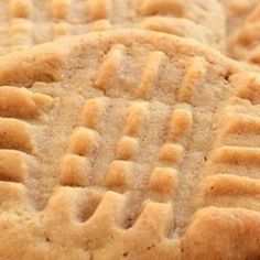 close up view of some cookies that are made to look like they have writing on them