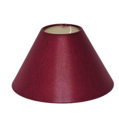 a red lamp shade is shown on a white background and it has a small light in the middle