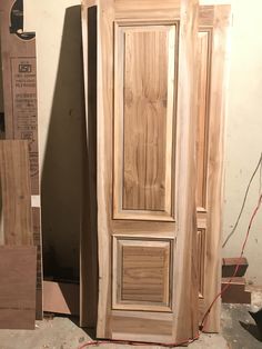 an unfinished door is being built in a room