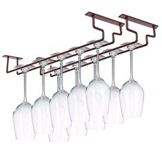 six wine glasses hanging from a rack with metal bar handles and glass holders on it