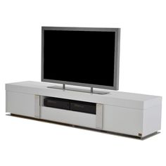 a white entertainment center with a flat screen tv on it's sides and drawers