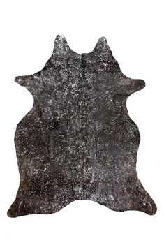 a black and white photo of a cowhide rug on a white background with space for text