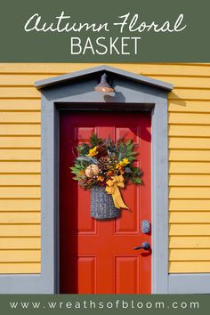 a red door with a wreath on it and the words autumn floral basket