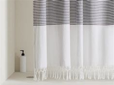 black and white striped shower curtain with tassels