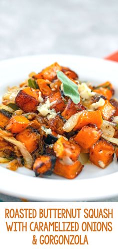 roasted butternut squash with caramelized onions and gorgonzola on a white plate