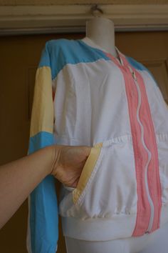 "Vintage 90s windbreaker jacket marked size 10. Light weight and great for jogging. In good vintage condition. Measurements taken across front lying flat 23\" armpit to armpit 15\" across waist 22\" length" Retro Cotton Track Jacket For Spring, Retro White Cotton Windbreaker, Retro Cotton Windbreaker For Spring, 90s Style White Windbreaker For Spring, Cotton Windbreaker For Sports In Spring, Spring Cotton Windbreaker For Sports, 90s Windbreaker, Studs And Spikes, Studded Leather Jacket