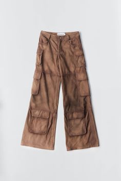 Deadwood's workwear-inspired cargo suede pants with wide flowing silhouette feature side pockets and multiple cargo pockets on the legs with a hidden push button closing. Made from upcycled deadstock goat suede Relaxed wide fit Zip fly Lining fabric from 100% recycled plastic bottles Luxury Brown Denim Bottoms, Luxury Leather Bottoms With Pockets, V Neck Cargo Pants, Stationery Brands, Suede Pants, Denim Outerwear, Maria Black, Knitwear Dress, Curated Vintage