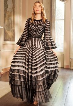 Evening Tiered Gown With Ruffled Skirt, Tiered Ruffled Gown For Gala, Evening Gown With Ruffles And Long Sleeves, Elegant Tiered Ruffle Gown, Long Sleeve Ruffled Gown For Gala, Evening Tiered Tulle Gown, Spring Ball Gown With Ruffles, Tiered Tulle Gown For Evening, Spring Ruffled Ball Gown