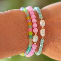 A little beachy, a little boho, and so fun, this sea glass bracelet features matte glass beads in fun tropical-inspired hues. It's great for stacking and mixing with our other colorful stretch bracelets. Wear this with your favorite summer tees and shorts or summer dresses! Measures approximately 6.5" on high quality stretch cord. Cheap Colorful Beaded Bracelets For Beach Season, Playful Cheap Beaded Bracelets For Beach, Stackable Casual Beaded Bracelets For Summer, Casual Stackable Beaded Bracelets For Summer, Casual Tiny Beads Stretch Bracelet For Beach, Everyday Summer Bohemian Stretch Bracelet, Adjustable Pastel Beaded Bracelets For Beach, Multicolor Stackable Stretch Bracelet For Beach, Adjustable Pastel Beaded Bracelet For Beach