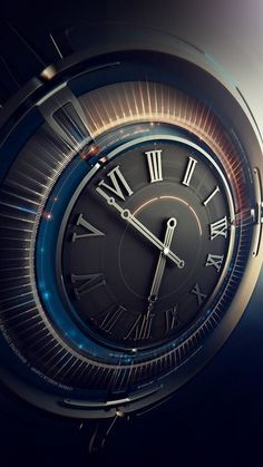 an analog clock with roman numerals on the face