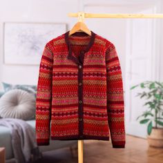 From the ancient lands of the Empire, Fernando Cano's newest design captures the magical beauty of the Andes in the stunning textile that composes this garment. Made with a geometric Inca pattern, this 100% alpaca cardigan—from Peru—features long sleeves and a comfortable crew neck, accented with a buttoned closure that combines gloriously with the red base hue. Inca Pattern, Alpaca Cardigan, Sweater Accessories, News Design, Cardigan Sweater, Alpaca, Peru, Sweater Cardigan, Sweaters & Cardigans