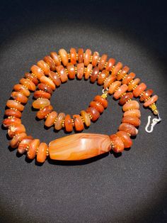 The orange color carnelian beads from my collections The origin of this beads from Nepal Himalaya although the carnelian agate can be found in Tibet Pakistan India Nepal and Afghanistan as well carnelian agate was used as prayers beads in mala and used as jewelry and amulet as well old agate and carnelian was used as trade items as well in ancient times The age of this beads are more than 600 years some gold color brass beads are used as spacers very smooth and shinny surface of this beads becau Rare Beads, Carnelian Agate, Beads Mala, Carnelian Necklace, Brass Beads, Carnelian Beads, Mala Necklace, Agate Necklace, Old Jewelry