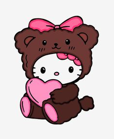 a brown bear with a pink heart sitting on the ground